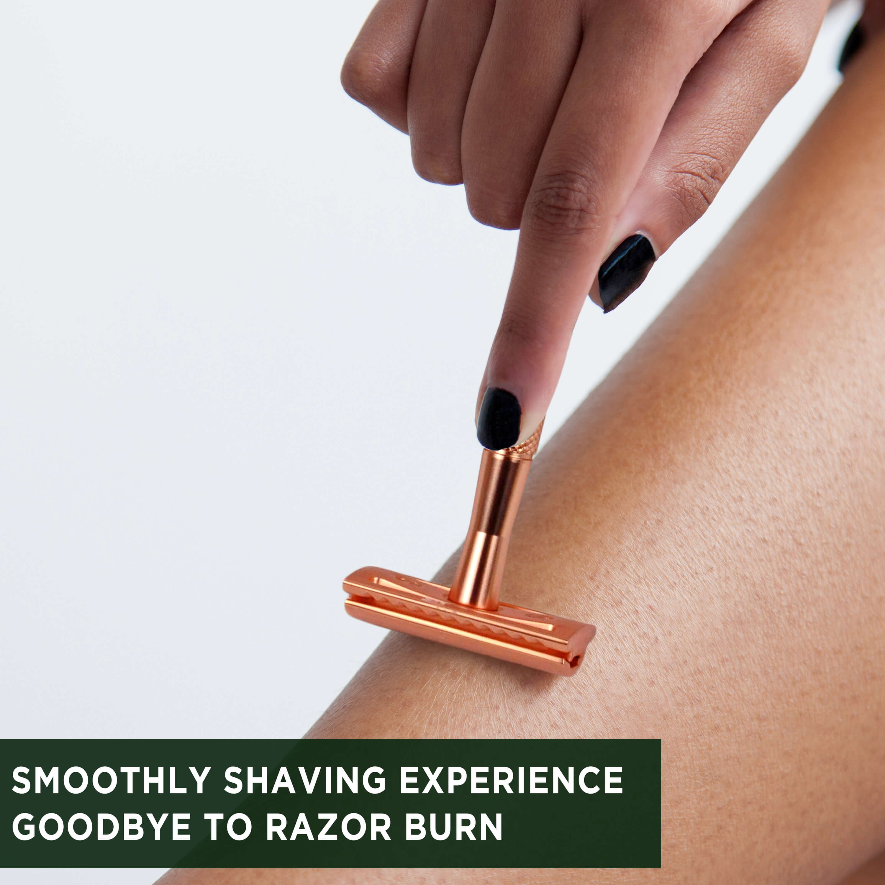 A Woman Is Shaving Her Legs With A Zomchi Rose Gold Safety Razor
